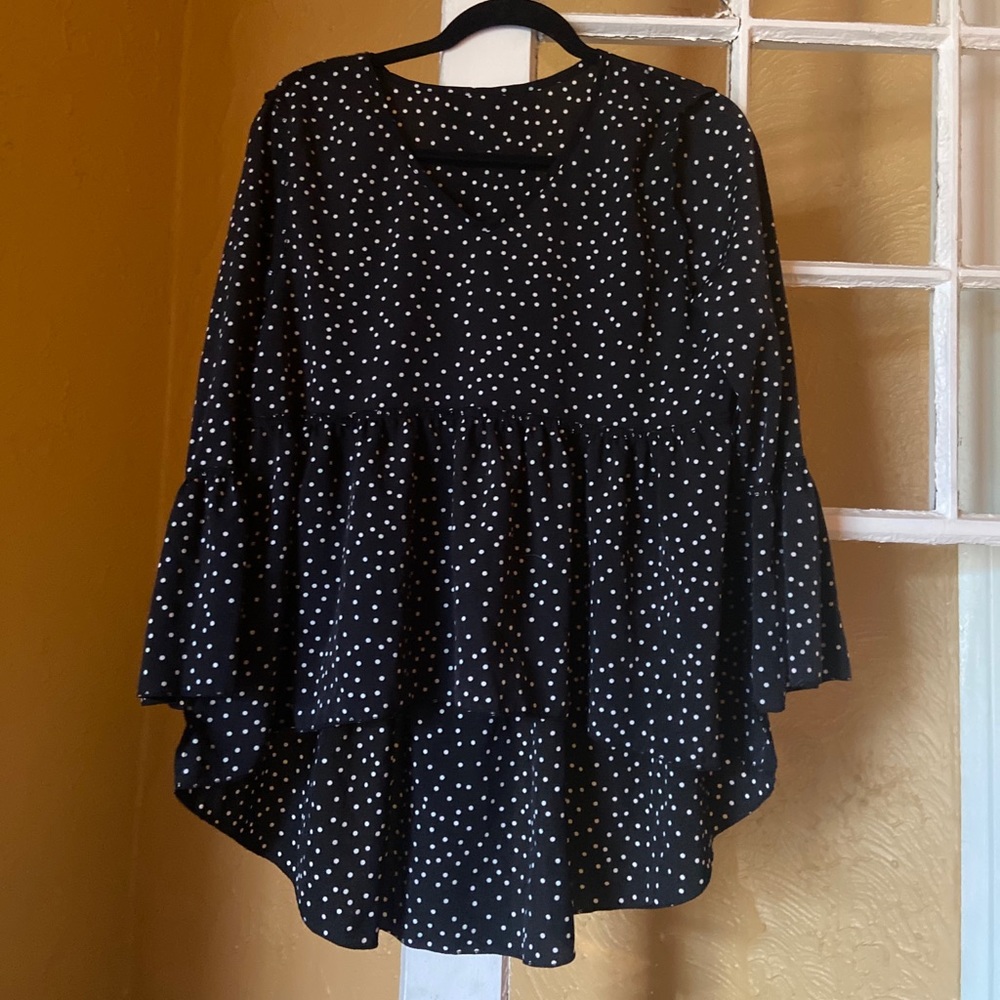 Polka dot peplum top